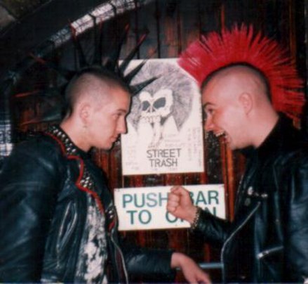 1980s punks with leather jackets and dyed mohawk hairstyles