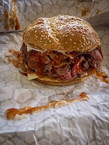 A roast beef sandwich "three way"--mayo, barbecue sauce, and American cheese Roastbeef NewEngland Boston.jpg
