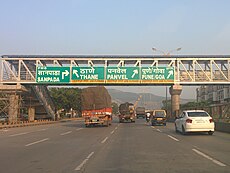 Exit sign for Thane–Belapur Road on Sion Panvel Highway near Sanpada.