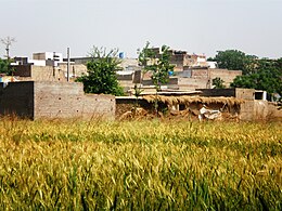 Seri-Bahlol Showing village view and agriculture land.JPG