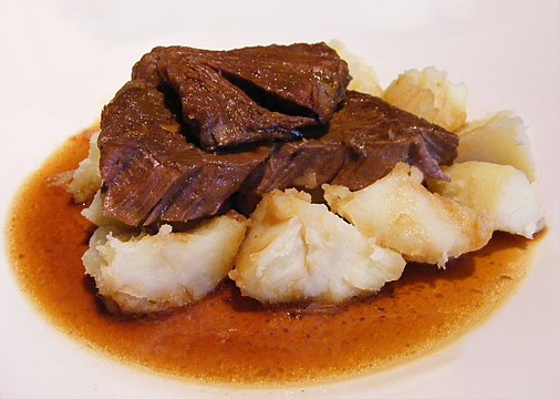 Sudderlapjes is slowly simmered beef, most often served with potatoes.