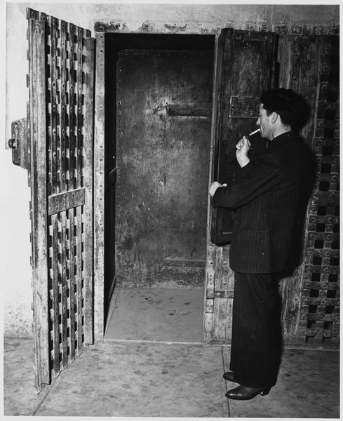 File:Taos County, New Mexico. Sheriff Montoya displays, with some pride, the tiny cell in which are lock . . . - NARA - 521886.tif