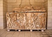 Sarcophagus from Tel Turmus, 3nd century CE, with Dionysos between the seasons of the year. The lid bears the images of the deceased and his wife.