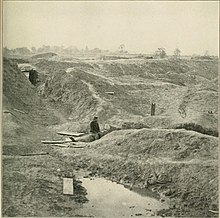 Result of the 8,000 lb (3,600 kg) of powder explosion under the Salient, 1865 The photographic history of the Civil War - thousands of scenes photographed 1861-65, with text by many special authorities (1911) (14760556754).jpg