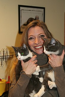 Trude Mostue with two cats.jpg