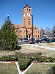 A view of the Macon County Courthouse from the park in the town square. The Main Street Historic District was added to the National Register of Historic Places on March 12, 1984.
