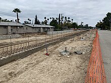 University station eastern terminus under construction, April 2020. University Station terminus of Arrow Metrolink Commuter rail under construction at University of Redlands in Redlands, CA.jpg