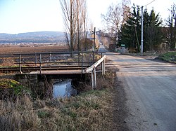 Část potoka u železniční zastávky