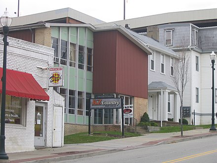 WKZV's last studio location in its history on the second floor of 80 East Chestnut Street in Washington, Pennsylvania. Note the WKZV call letters on the second floor on-air studio window and the signage out front.