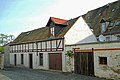 Wohnhaus in geschlossener Bebauung, im Hof ein Stallgebäude an der Finsteren Gasse