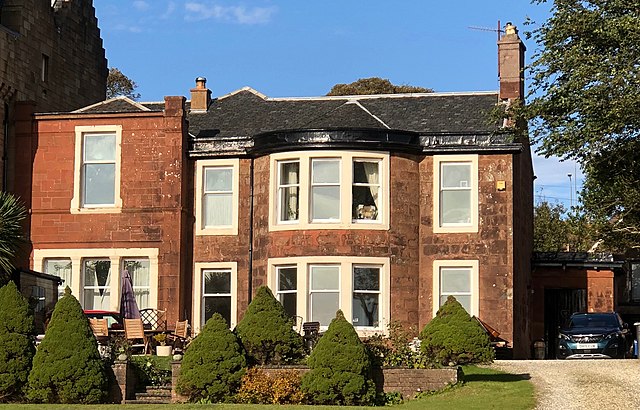 Mansfield House, 18th century villa still recognisable despite extensions.