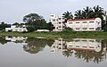 * Nomination Reflections of GRD College of Science, view from west from Coddissia Ground, Coimbatore --Tagooty 02:10, 16 December 2023 (UTC) * Promotion  Support Good quality. --Rjcastillo 03:43, 16 December 2023 (UTC)