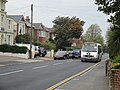 Wightbus 5898 (HW04 DDJ), an Optare Alero, in Marlborough Road, Ryde, Isle of Wight, on route 20. It is seen on the last day of the routes operation, and is wearing a wreath on the bonet of the bus to comemorate this.