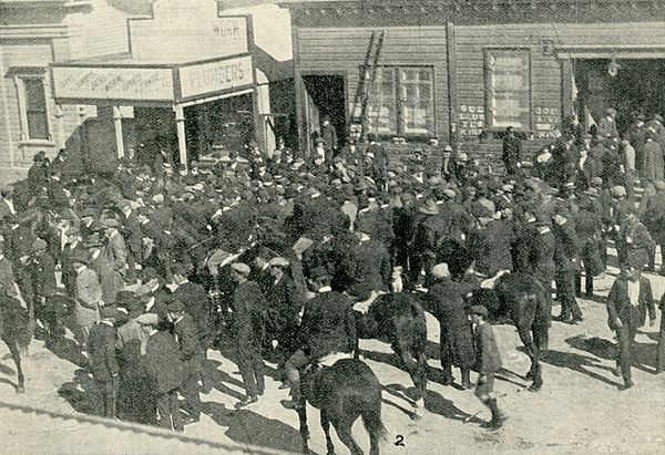 The scene outside of the Miners' Hall just after it was stormed and Evans was beaten (the Hall is on the right).