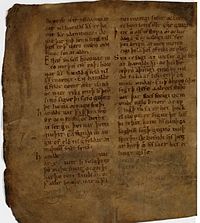 Page of ancient manuscript on weathered, yellowed paper