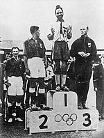 1956- Melbourne Olympic Olympic Victory Ceremony.jpg