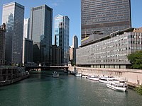 Stella Foster was a journalist with the Chicago Sun-Times (pictured) before her retirement. 2003-08-23 View from Michigan Ave bridge in Chicago.jpg