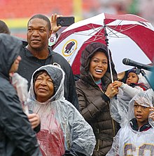Chris Samuels with his family (2019) 49ers at Redskins 2019 K0A7352 (48937626887).jpg