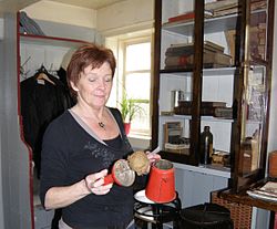 Anna Kirstin Thomsen from Tvoroyri Faroe Islands Holding An Old Emergency Lamp.jpg