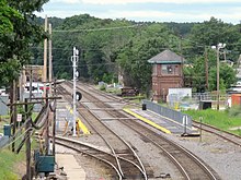 Ayer station in 2021. The wye to the Worcester Branch is at left, with the Wall Track at far right. Ayer station from Main Street bridge, July 2021.JPG