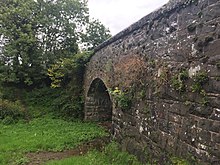 The Glen Road bridge, which was at the end of the platform, still stands today. Ballygowan Bridge.jpg