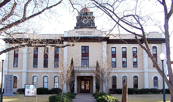 The Bastrop County Courthouse in Bastrop is designed in classical revival style. Built in 1883, the Courthouse and Jail Complex were listed in the Nat