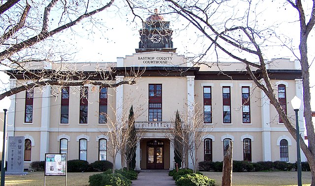 The Bastrop County Courthouse in Bastrop is designed in classical revival style. Built in 1883, the Courthouse and Jail Complex were listed in the Nat