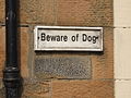 "Beware of Dog" sign at the Glasgow Necropolis