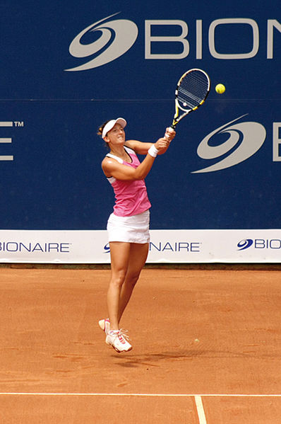 Romanian Irina-Camelia Begu lifted both singles and doubles champions' trophies in 2011