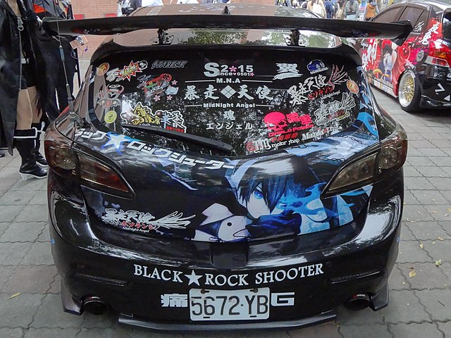 The titular character of the series on an itasha in 2018