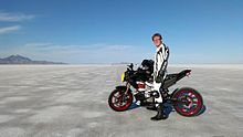 Brandon Nozaki Miller on the first production electric motorcycle to break 161 km/h (100 mph), a 2012 Zero S ZF6 at Bonneville Salt Flats (2012) Brandon Nozaki Miller at bonneville 2012.jpg