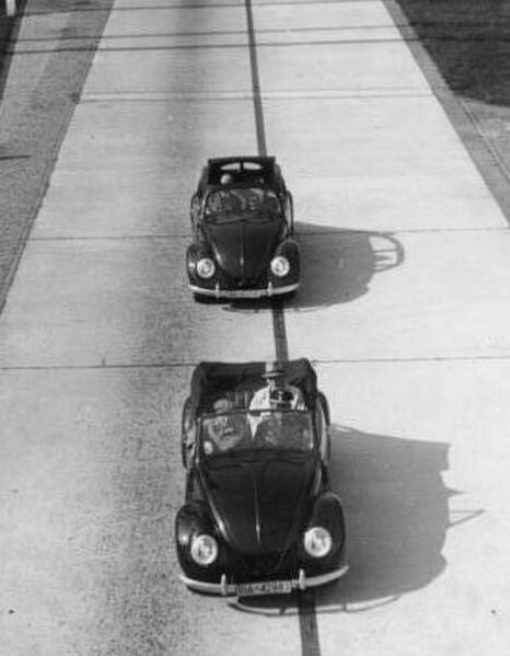 Two KdF cars on the Reichsautobahn, c. 1943. Since the KdF was never delivered to the public, it is likely that this was an advertisement photo.
