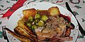 Christmas Dinner 2014 Stuffed Roast Turkey leg, roast potatoes, parsnips, brussel sprouts, pigs in blankets, cranberry sauce & gravy (48122315877).jpg
