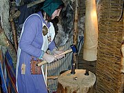 A modern representation of Viking coin making at the Jorvik Viking Centre in York, England.