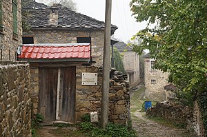 Stone houses paved streets shape the townscape.