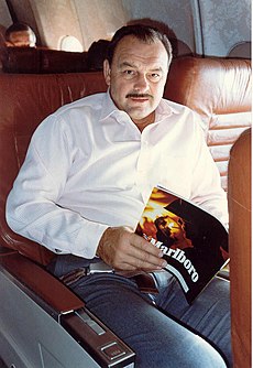 An image of Dick Butkus's reading a magazine.