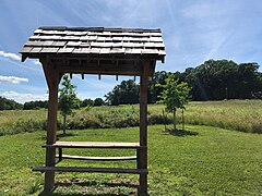 Picnic bench overlooking meadow at Doylestown Central Park Doylestown Meadow .jpg