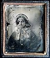 Early ambrotype of a young lady with a bonnet (6086261850).jpg