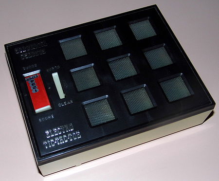 The Electro Tic-Tac-Toe game by Waco, 1972 Electro Tic-Tac-Toe by Waco, Made In Japan, Copyright 1972 (Electronic Handheld Game).jpg
