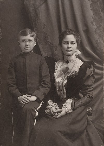 In his Cheltenham Military Academy uniform with his mother, 1898