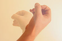 220px-Fingers_and_thumb_in_circle_downward_motion.jpg