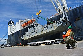 Flickr - Official U.S. Navy Imagery - Sailors offload equipment from ship..jpg