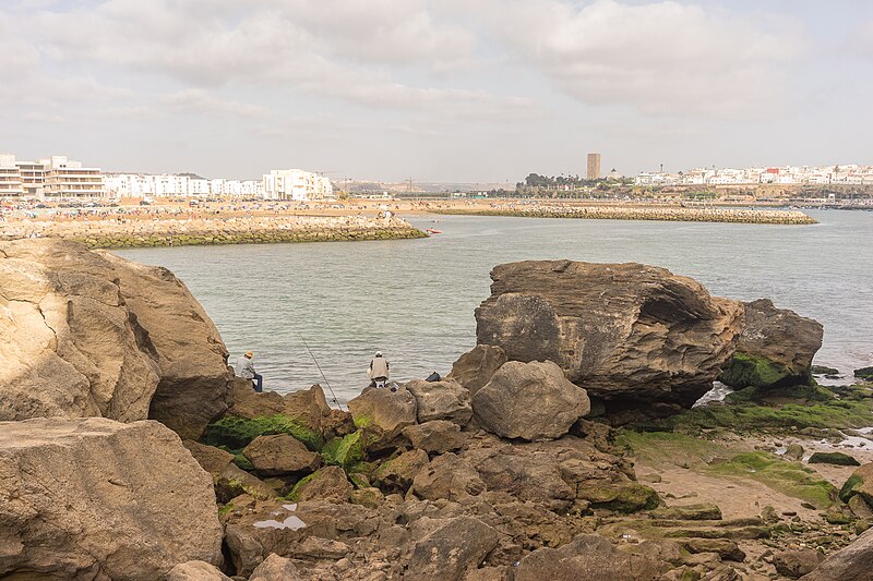 File:From the kasba of oudaya beach 2 fishermans taking their time witha view on rabat ad her famous tour.jpg