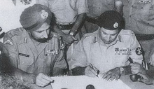 Gen. Niazi (Pakistan) surrenders to Gen. Jagit Singh Aurora (India).png
