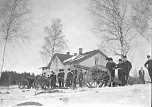 Swedish artillerymen in Haraldsby during the Invasion of Aland in 1918. Haraldsby artillery 1918.jpg