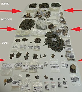 The hoard sorted by it contents at the British Museum in August 2019. Huntingdon Cambridgeshire "Muddy Hoard" 2018 sorted.jpg