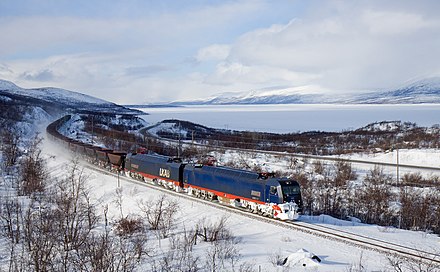 A freight train at Torne Träsk, a lake in the very north of Sweden.