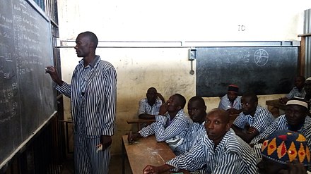 Inmate teaching other inmates in Kenya
