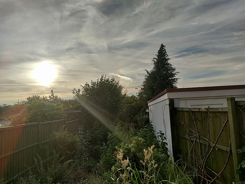 File:Iridescent clouds and sun July 13 22 05.jpg