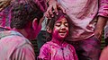 Joyful kid playing holi by DrRohithgurugubelli